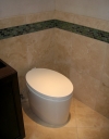 A Contemporary oval toilet.